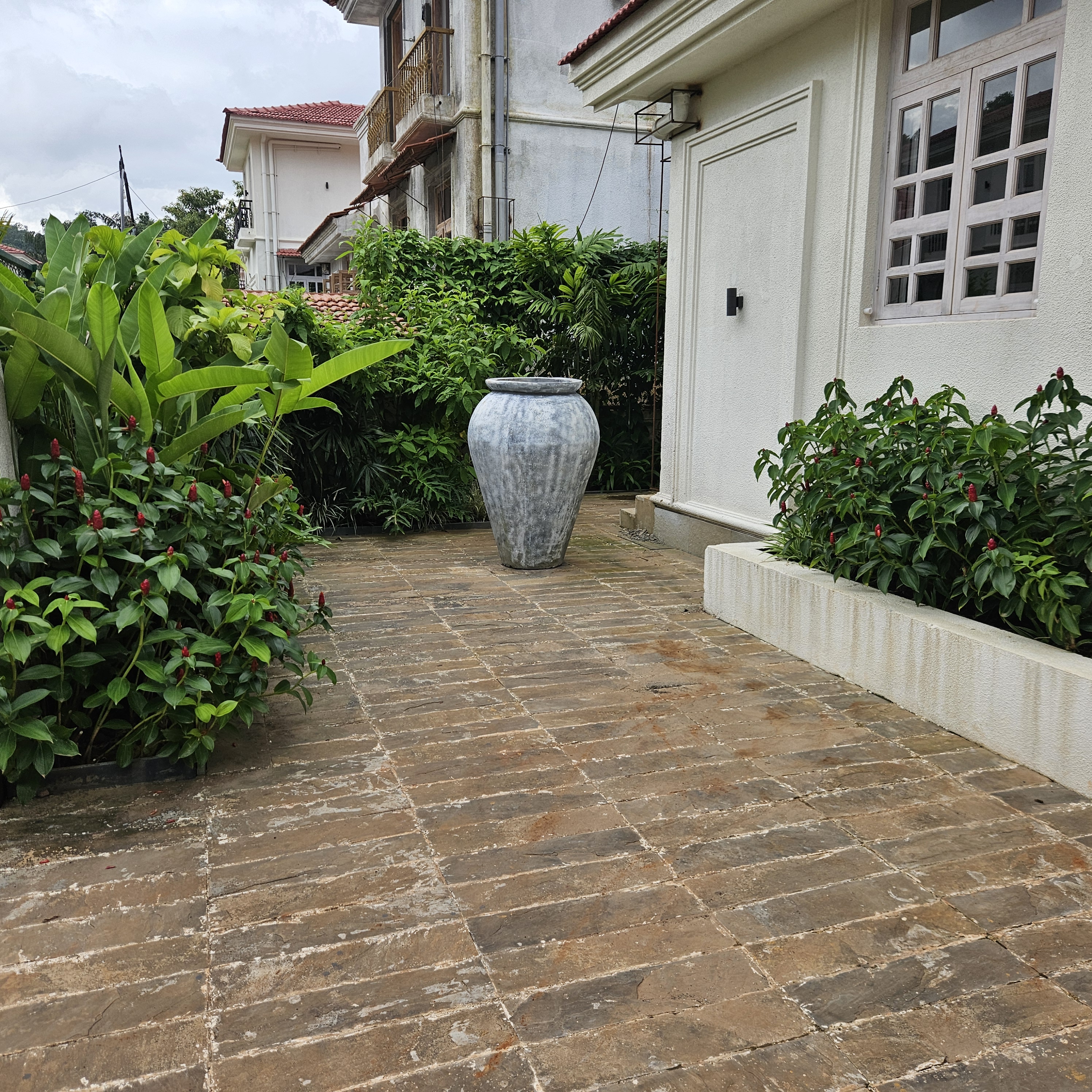 Tropical landscape design at Siolim Isprava villa with curated garden elements